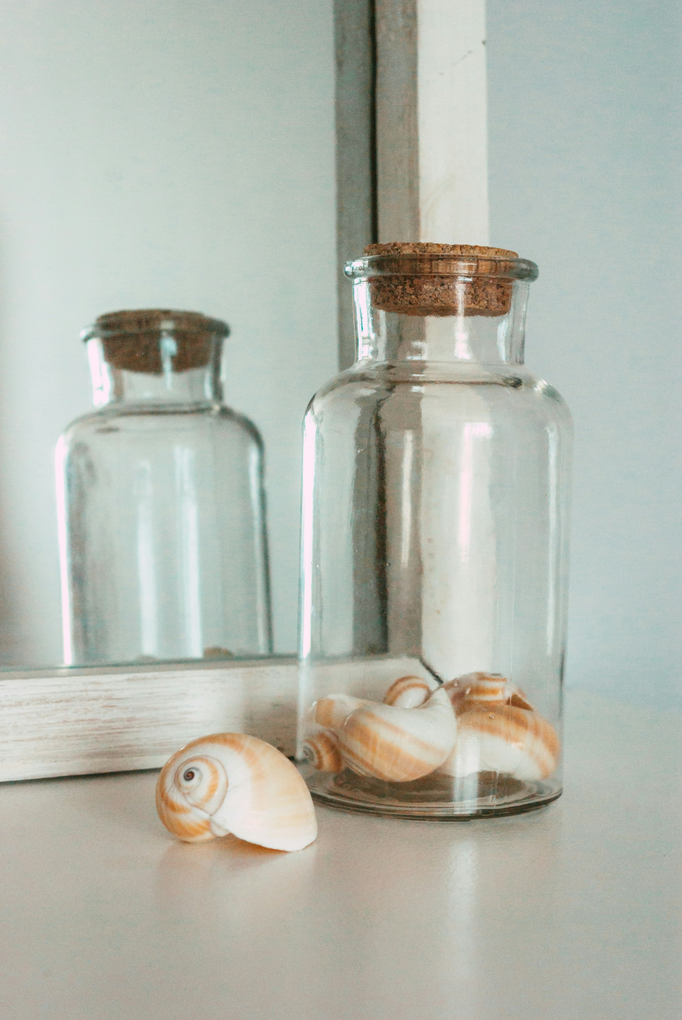 clear glass jar with white liquid inside